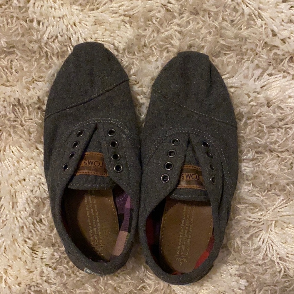 Tom’s slip on shoes worn without laces